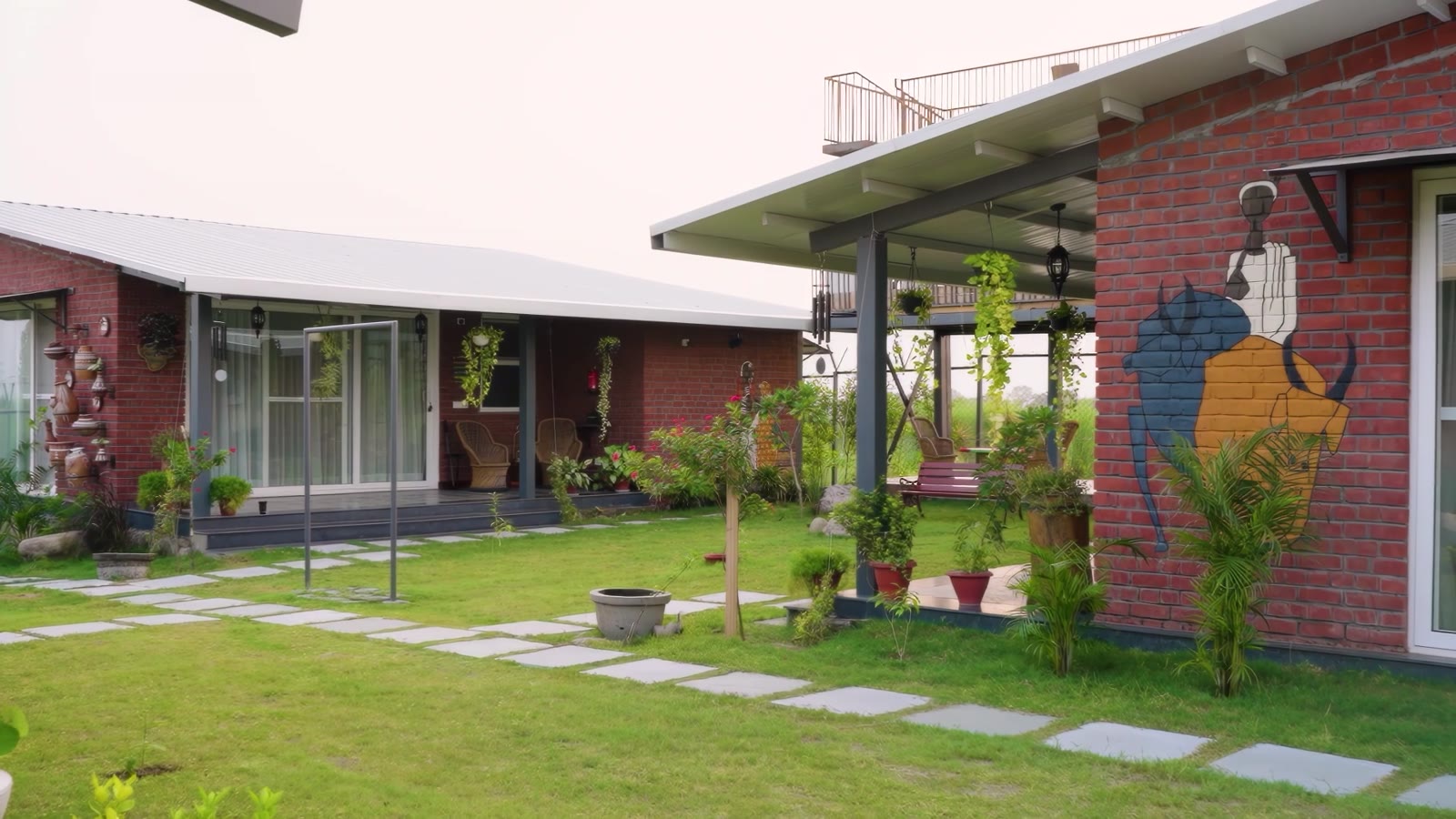 Rustic cottages and peaceful pathways through Sabr's gardens